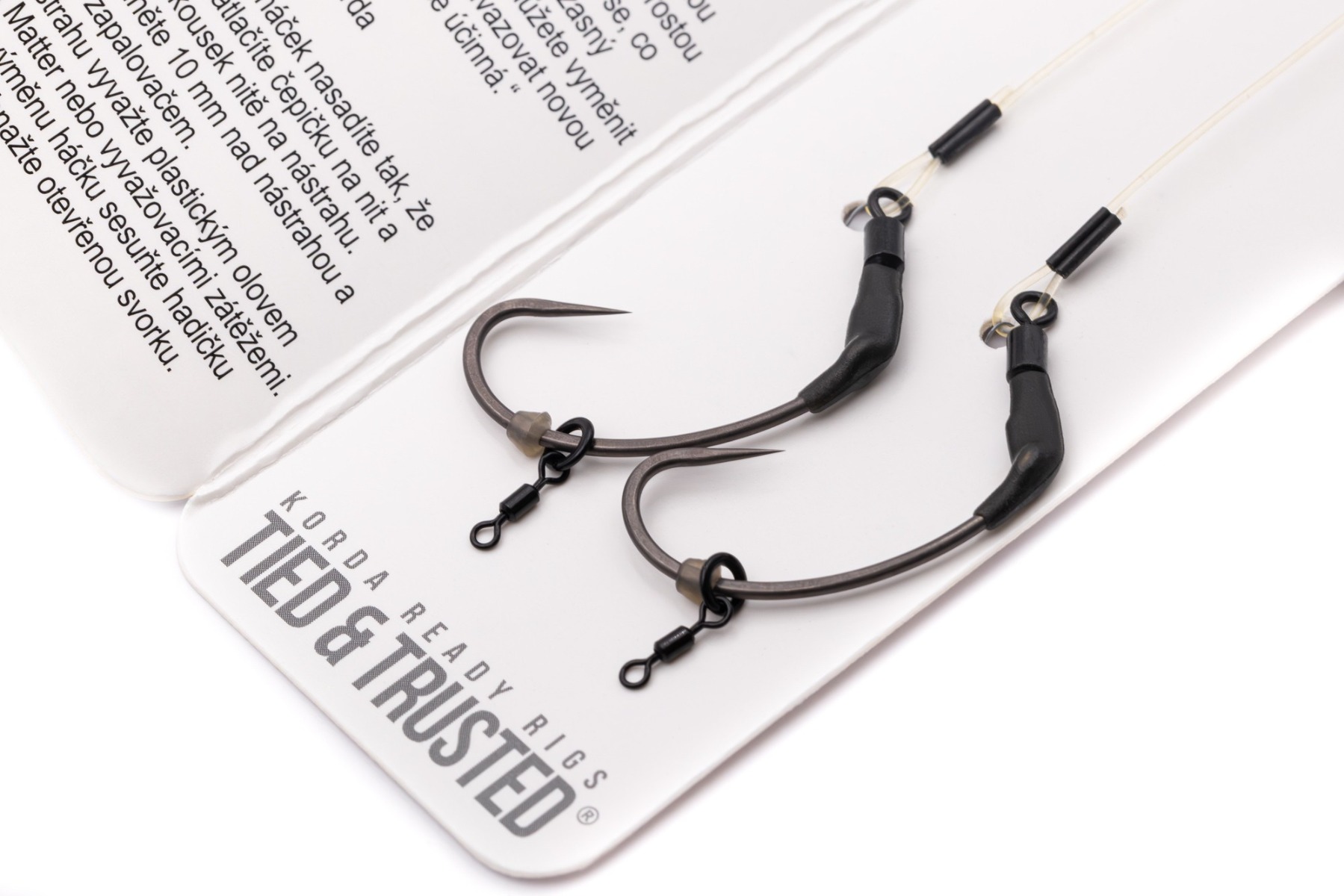 Korda Ready Tied Spinner Rigs on their card, showing the curved shank hooks on the boom